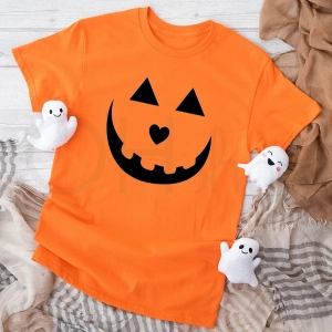 Pomarańczowa-koszulka-dla-dziewczynki-na-halloween-uśmiech.webp
