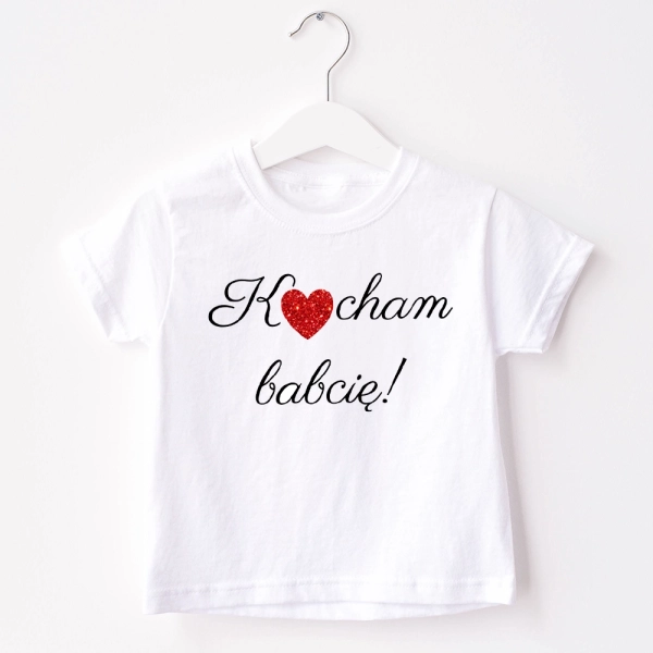 Biała-koszulka-dziecięca-kocham-babcię-brokat.webp