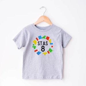 Szara-koszulka-dziecięca-klocki.webp