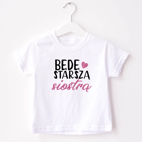 Biała-koszulka-będę-starszą-siostrą-różowy-brokat.webp