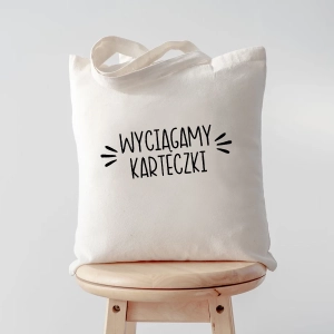 Torba-eco-beż-wyciągamy-karteczki.webp