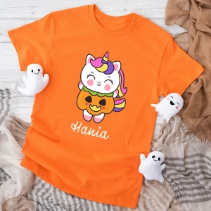 Pomarańczowa-koszulka-dla-dziewczynki-jednorożec-z-dynią.webp